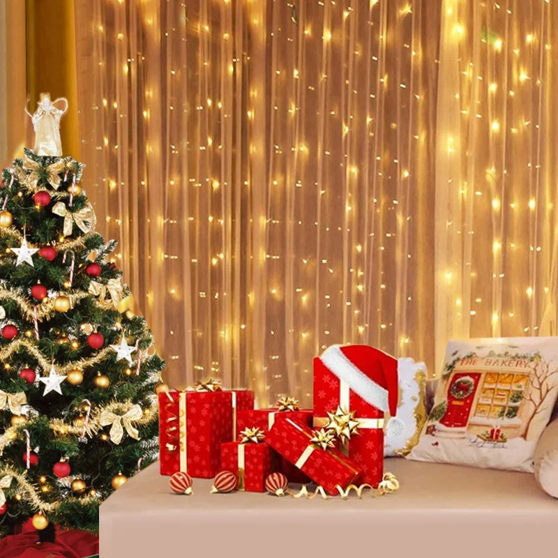 A festive scene with a decorated Christmas tree, glowing string lights, red and gold wrapped gifts, and a Santa hat placed beside holiday-themed cushions on a sofa.
