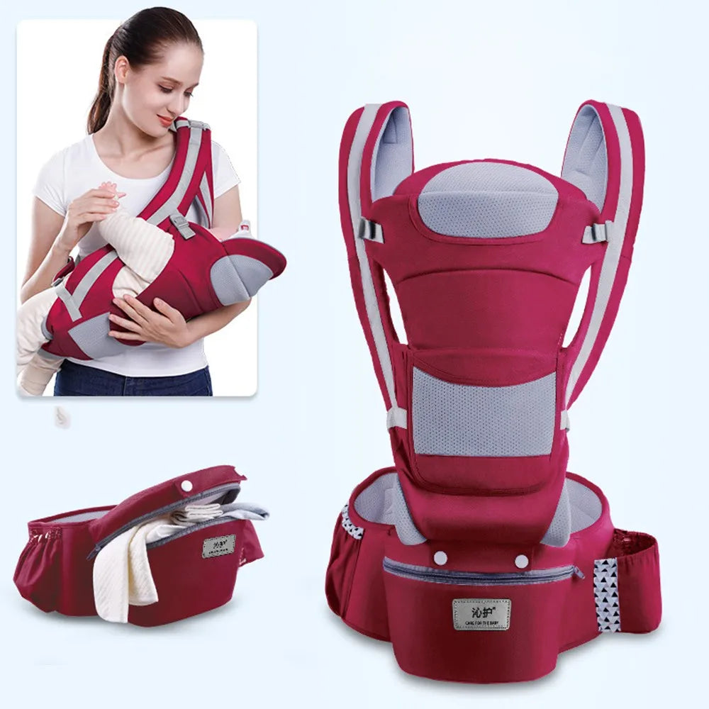 Red ergonomic baby carrier with multiple compartments, shown standalone and in use by a woman holding a baby. The carrier features breathable mesh and adjustable straps.