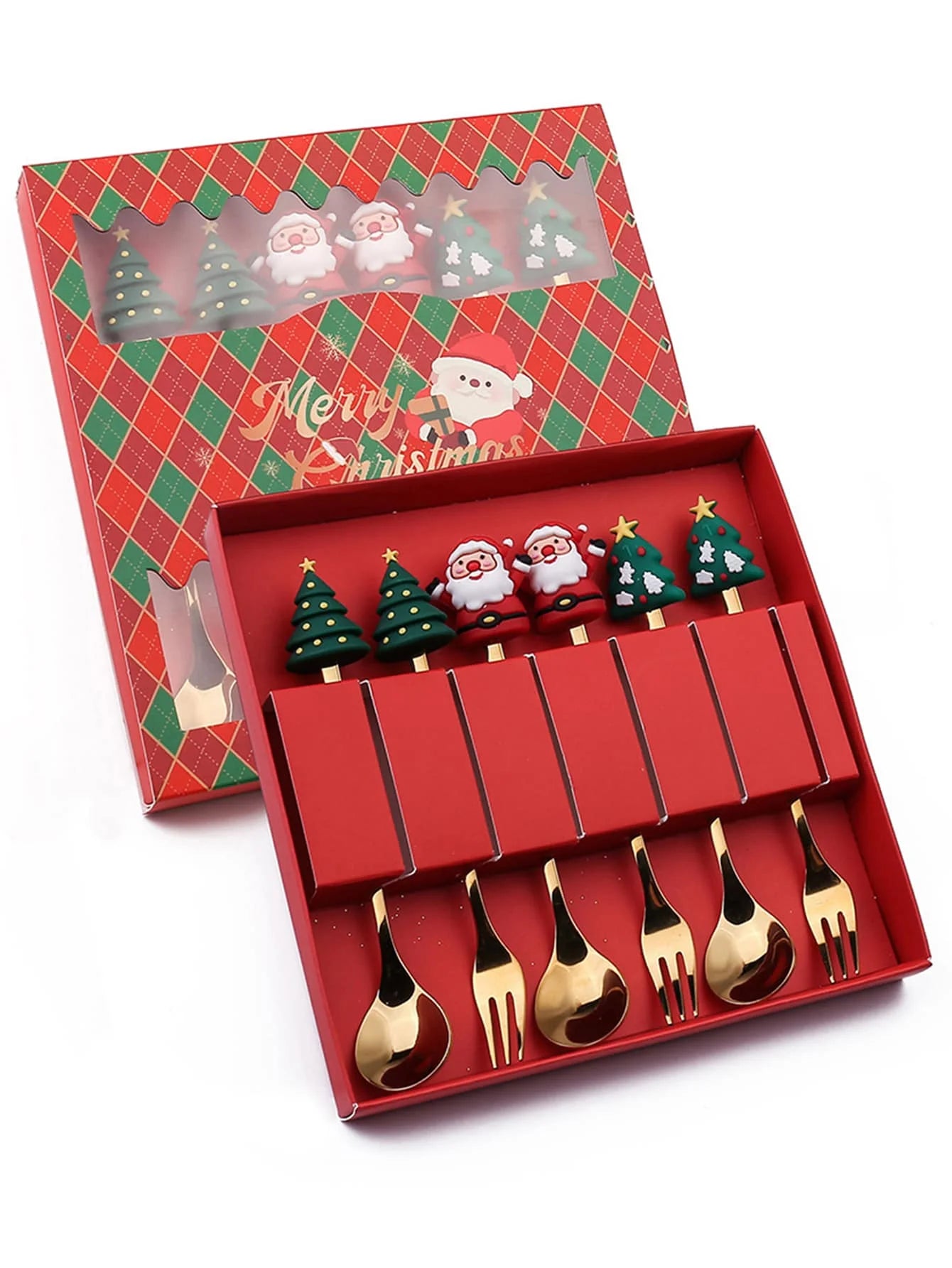Red festive cutlery set with gold spoons and forks, featuring handles shaped like Santas and Christmas trees. The box has a "Merry Christmas" theme with Santa illustrations.