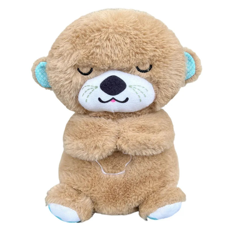Cute brown plush bear with embroidered eyes and nose, light blue ears, and paws. The bear is sitting with its arms crossed, exuding a peaceful, sleepy expression.
