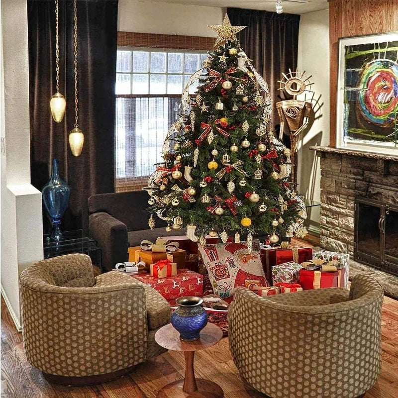 A festive living room with a decorated Christmas tree adorned with ornaments and a star topper. Wrapped gifts sit underneath. Two chairs and a small table with a vase are in the foreground.