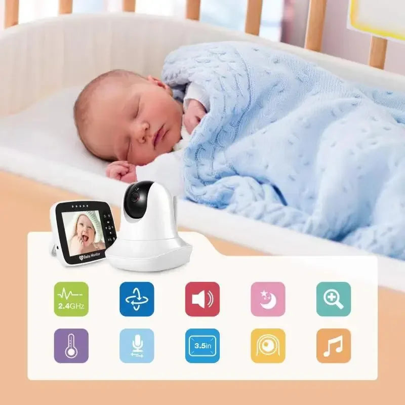 A sleeping baby in a crib, covered with a blue blanket. In the foreground, a baby monitor with a screen and icons indicating features like sound, temperature, and camera rotation.
