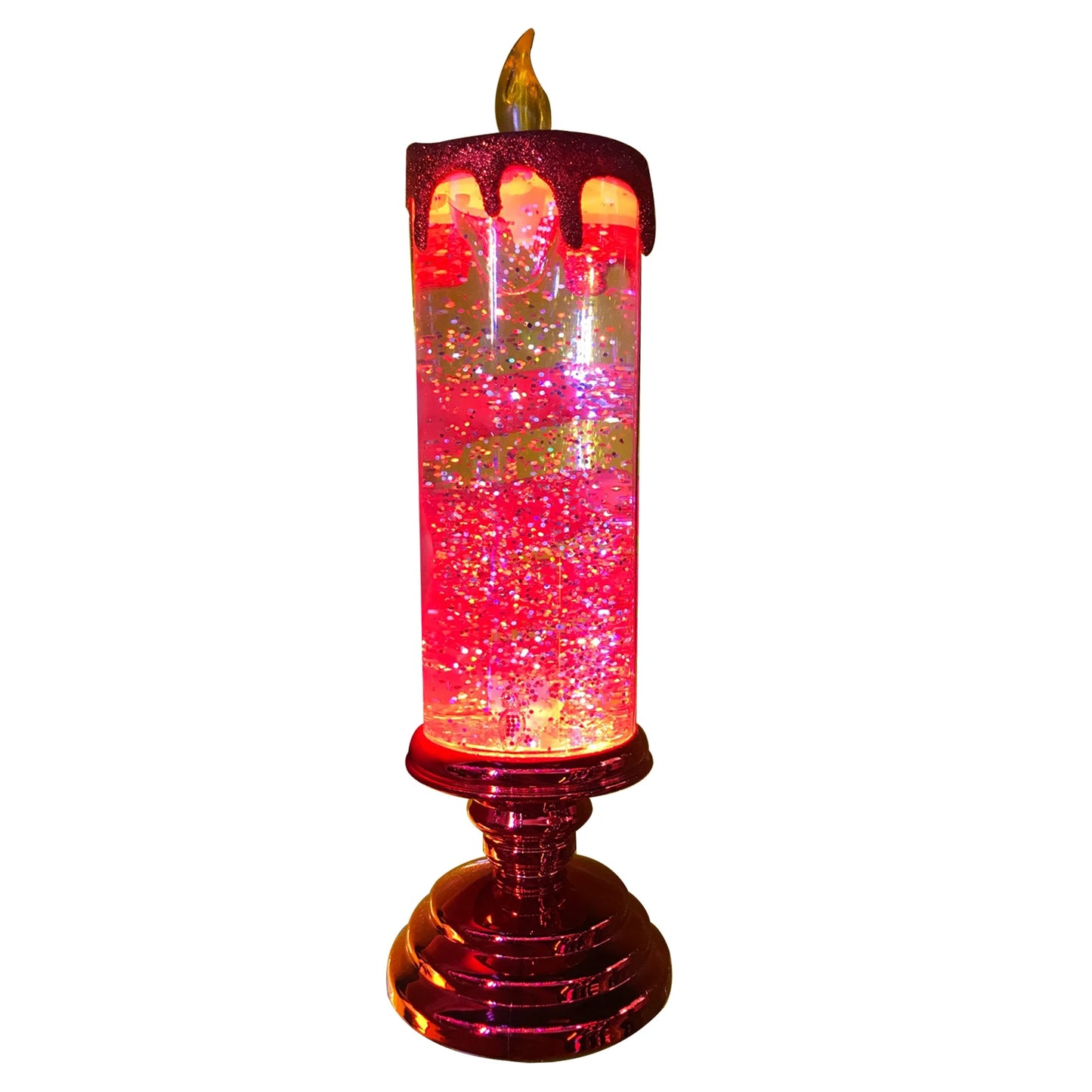 A glowing decorative candle with swirling red and gold glitter, topped with wax-like drips and a flame. It sits on a shiny red pedestal base, resembling a festive ornament.
