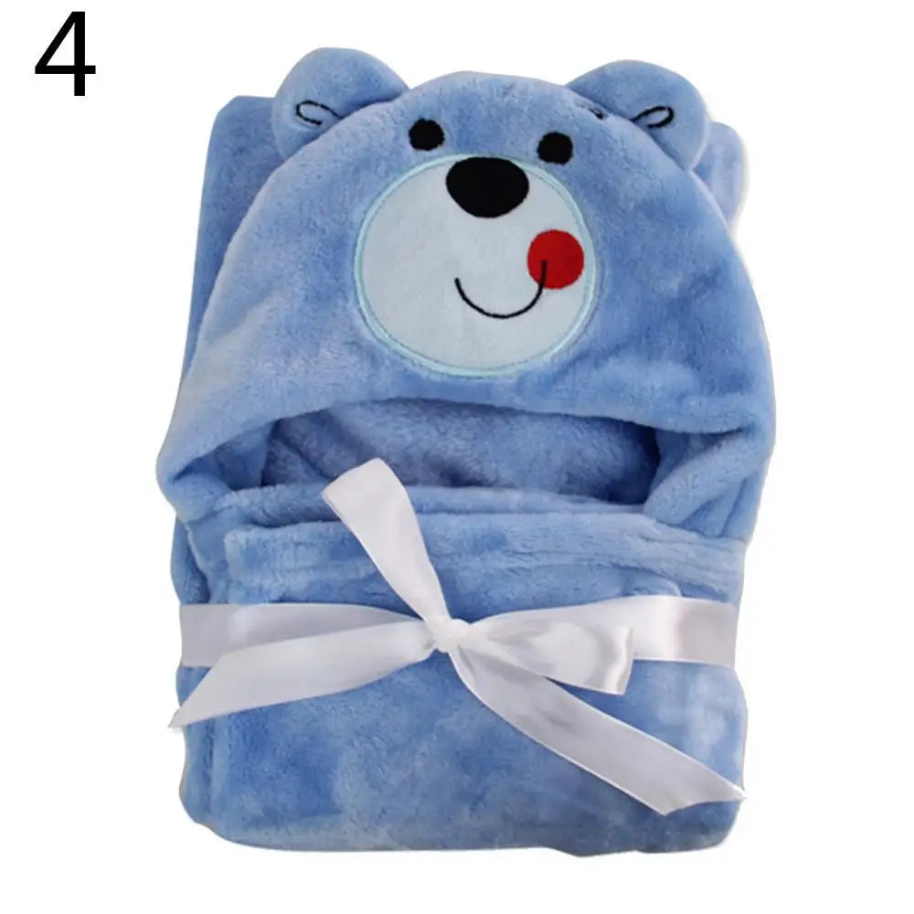 Cute blue blanket set featuring a smiling bear face with ears on the hood, tied with a white ribbon. Number 4 appears in the top left corner.