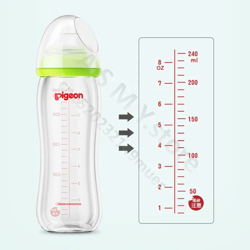 Clear baby bottle with green top showing measurement markings in ounces and milliliters, up to 240 ml or 8 oz. A comparison chart highlights both units alongside the bottle.