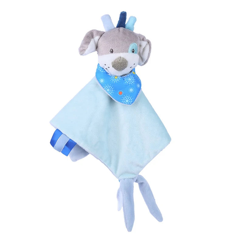 Plush baby comforter with a gray dog head, blue polka-dotted scarf, and light blue blanket body. Features blue fabric tabs and knotted ends for tactile engagement.