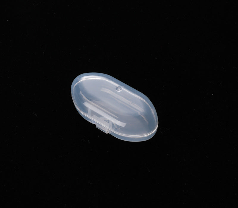 Transparent oval plastic container with a hinged lid, displayed against a black background.