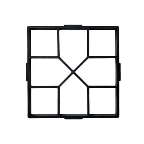 Black grid-shaped mold with six sections radiating from a central point, designed for creating evenly divided spaces or shapes.