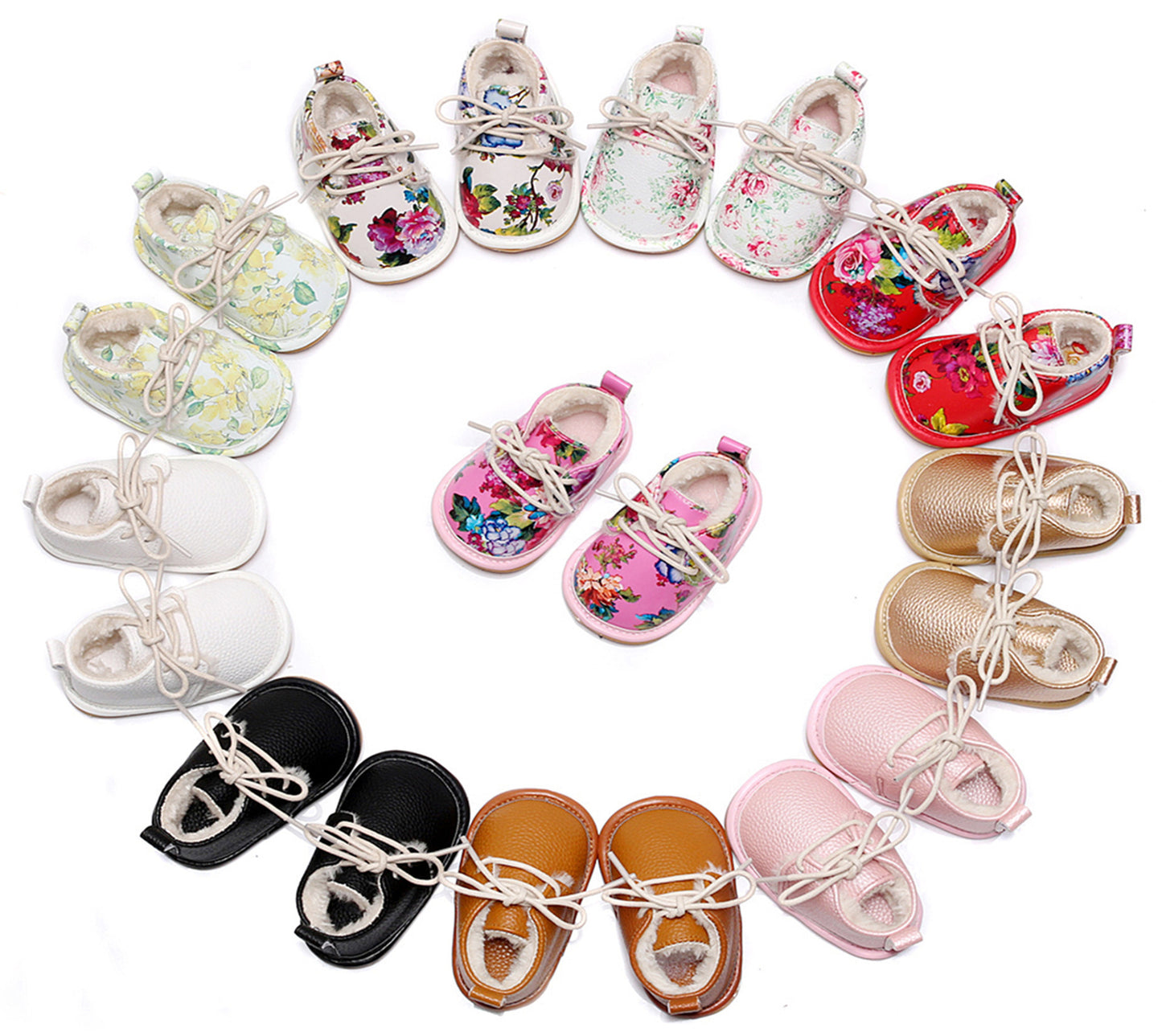 Circle of baby shoes with floral, plain, and metallic designs in various colors including black, brown, white, pink, and red, displayed on a white background.