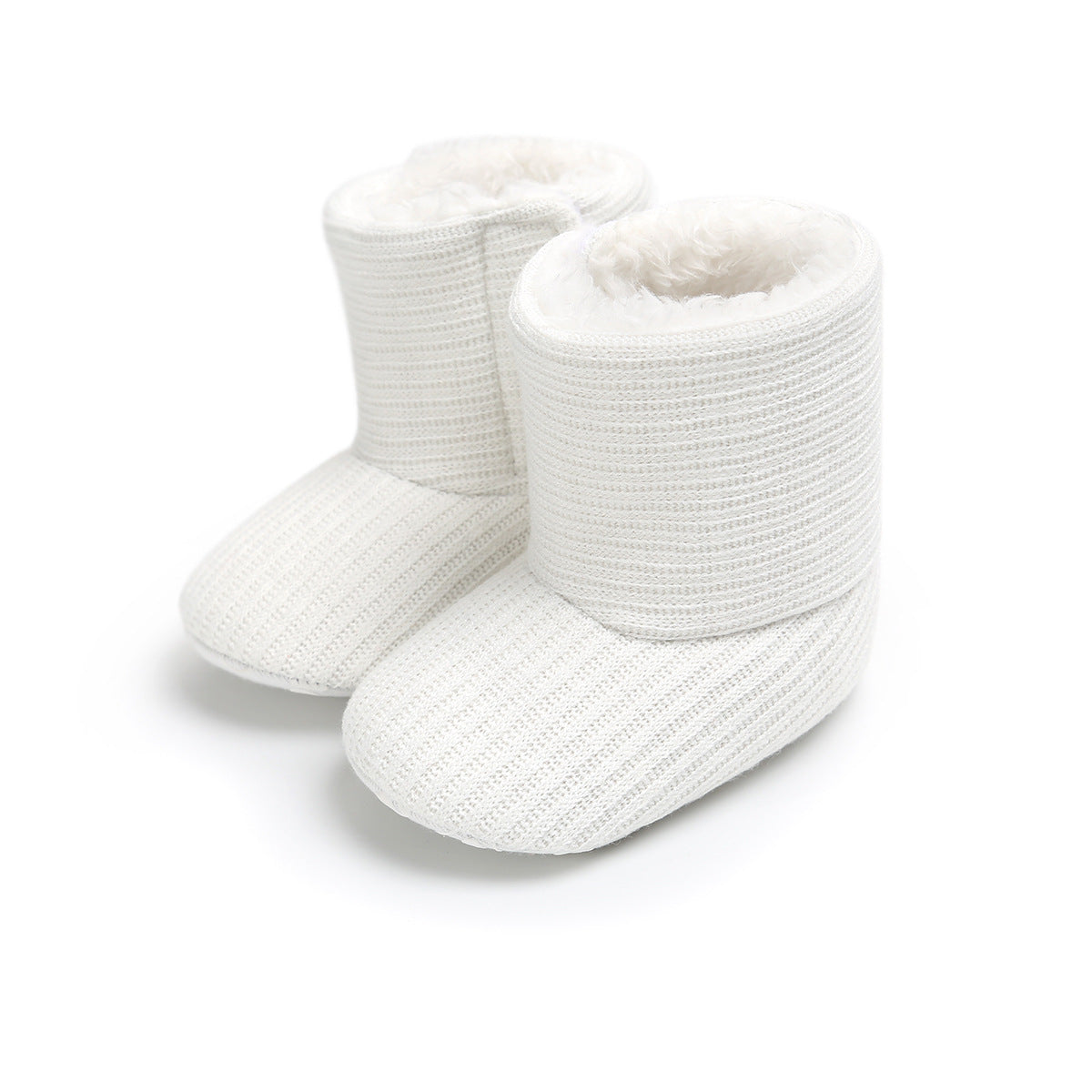 White knitted baby booties with a plush interior, designed for warmth and comfort. The booties have a ribbed texture and a soft, fluffy lining, ideal for infants.