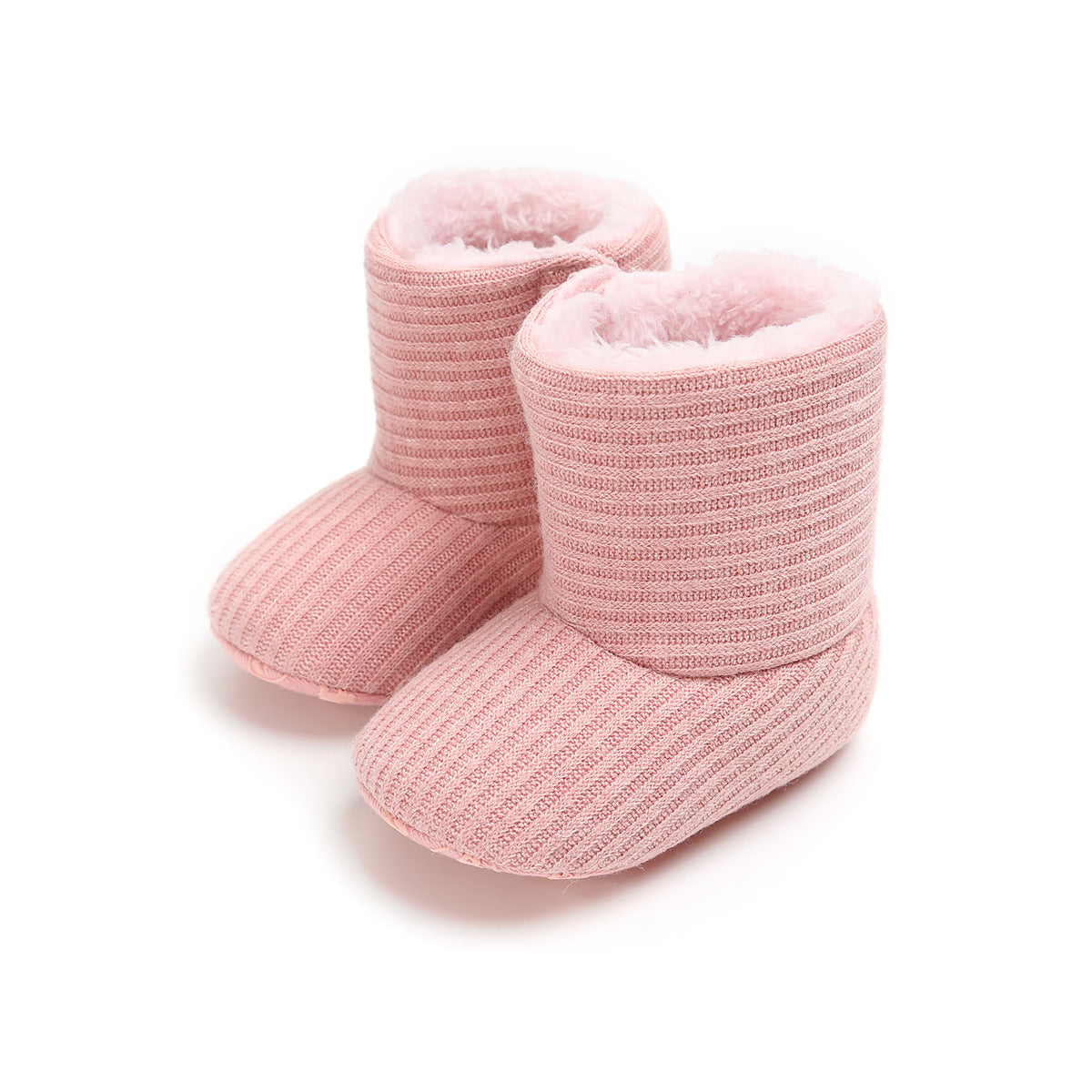 Pink knitted baby boots with a ribbed texture and soft, fluffy lining.