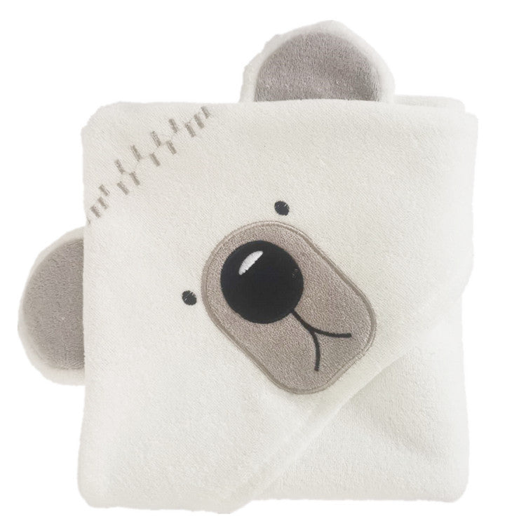 Soft white baby blanket folded to display a cute bear face design with stitched details and 3D ears.