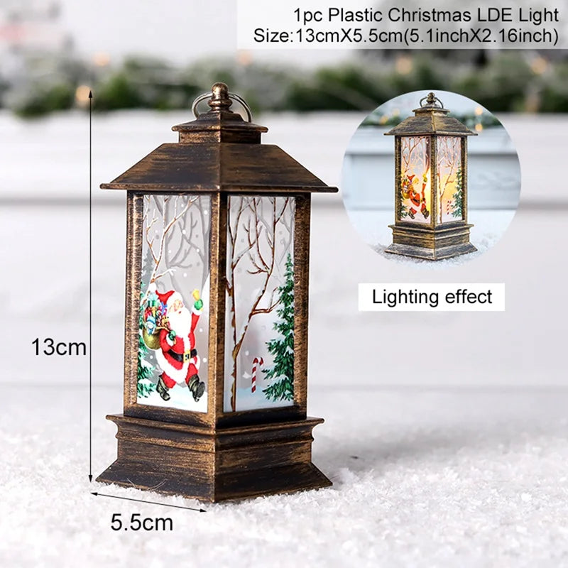 Rustic Christmas lantern with a Santa Claus design, measuring 13cm x 5.5cm. Features a glowing LED light effect, surrounded by snowy trees and festive decor.