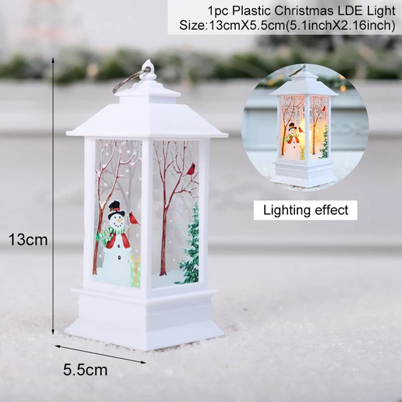 Plastic Christmas LED light measuring 13cm by 5.5cm, featuring a snowman and tree design. It illuminates from within, creating a warm, festive glow.