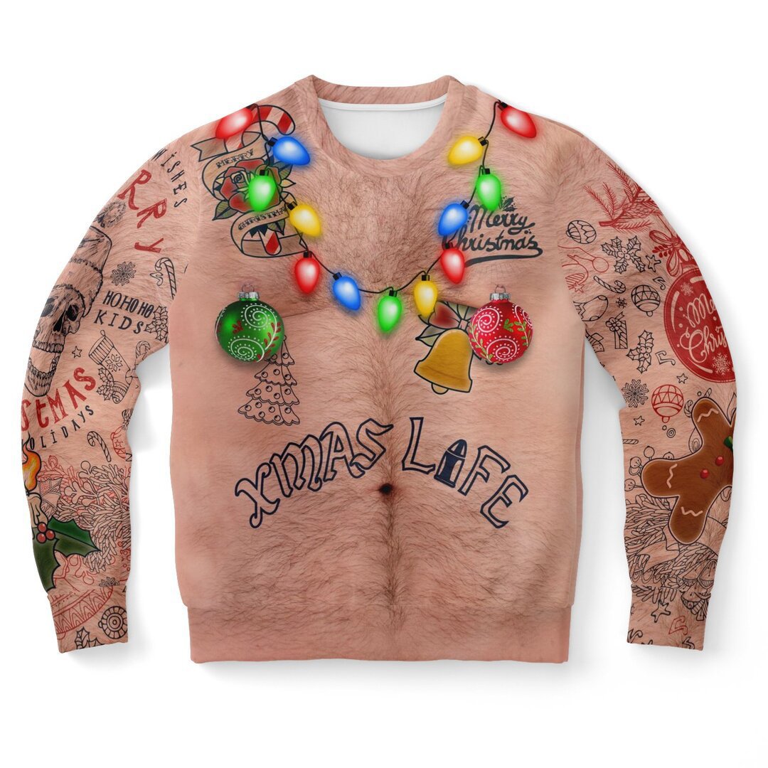 Novelty Christmas sweater with a hairy chest design, tattoos, and festive doodles. Features colorful lights, ornaments, gingerbread man, and "Xmas Life" text across the torso.