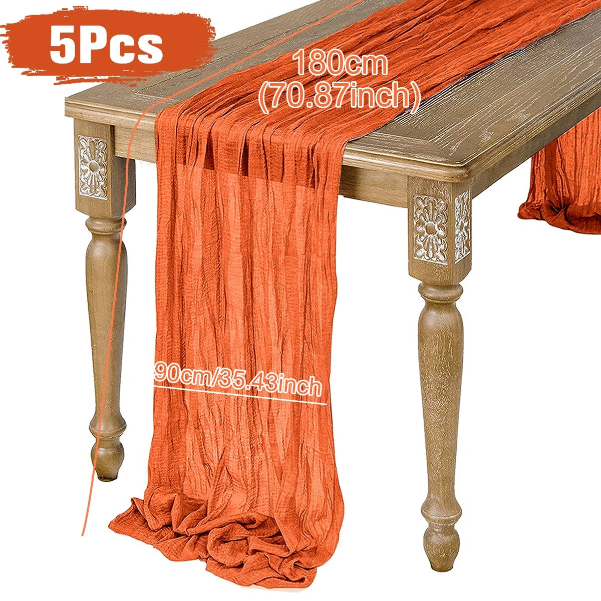 Five orange gauze table runners drape over a wooden table with floral carvings, measuring 180cm long and 90cm wide.