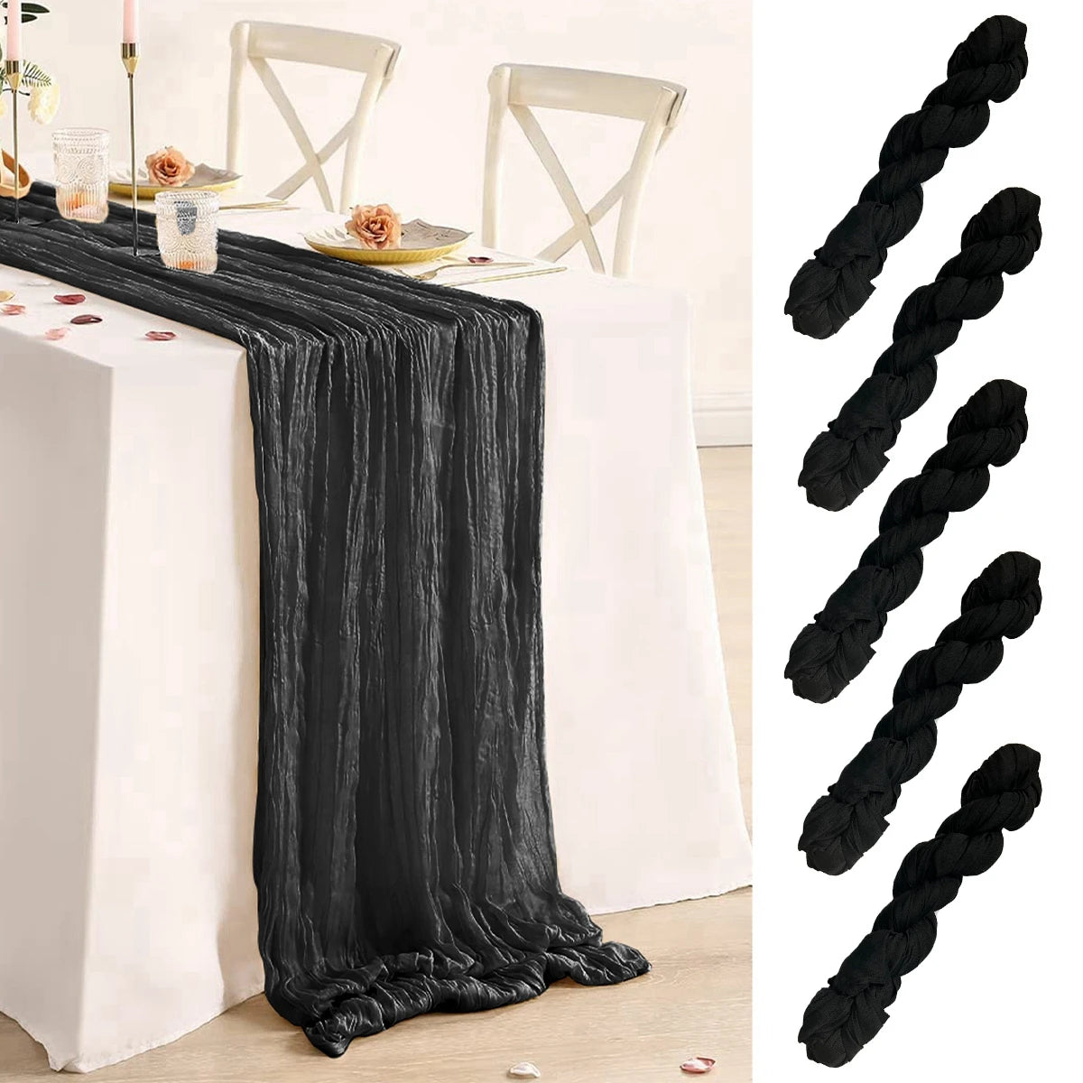 Elegant table setting with a white tablecloth and a long, black crinkled table runner. Four bundled black fabric pieces are shown, suggesting extra material.