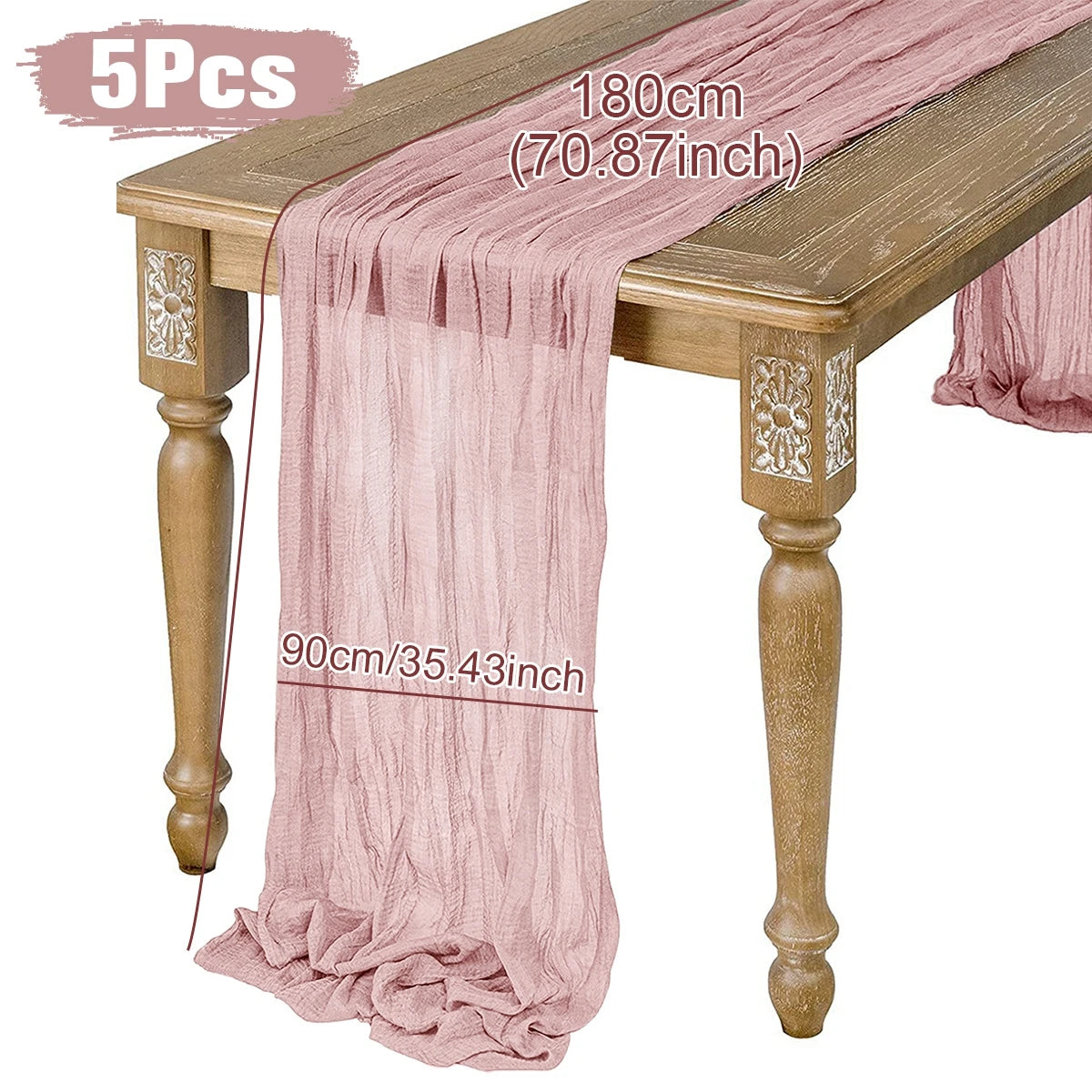 Pink gauze table runner draped over a wooden table with carved legs. Dimensions marked at 180cm (70.87 inches) long and 90cm (35.43 inches) wide. Set of 5 pieces.