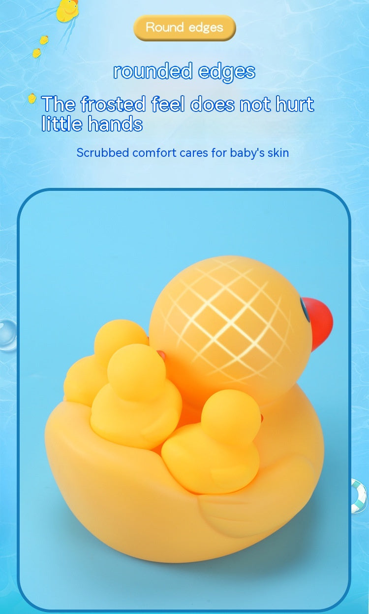 Yellow rubber duck family toy with rounded edges sits on a blue background. Text highlights softness and safety for children's hands, emphasizing comfort and skin care.